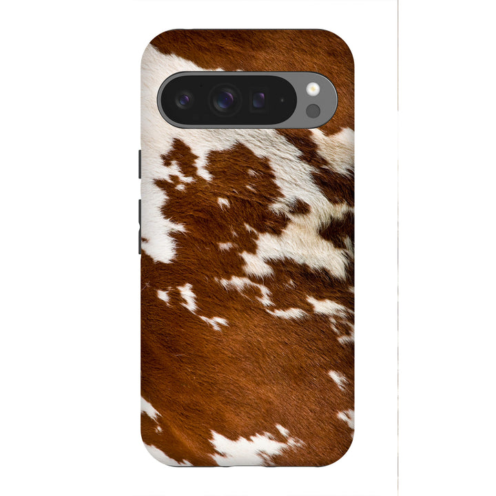A stylish Google Tough Phone case adorned with a classic cow print pattern, perfect for animal print enthusiasts.